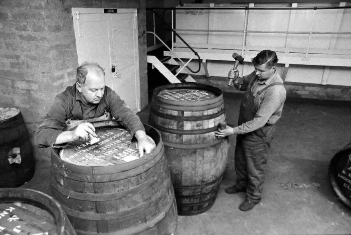 Framed Print : Coopers prepare Sherry casks before they are filled with Whisky at the Knockando Whisky Framed Print : Coopers prepare Sherry casks before they are filled with Whisky at the Knockando Whisky