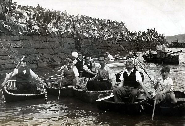 Coracle Racing - These coracle men, their age old craft slung about their shoulders