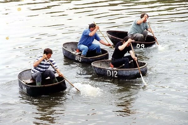 Coracle racing - The tradition of coracle racing returned to the Tywi at the weekend - as