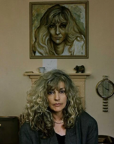 Coral Atkins actress sitting in front of self portrait DBase A©Mirrorpix