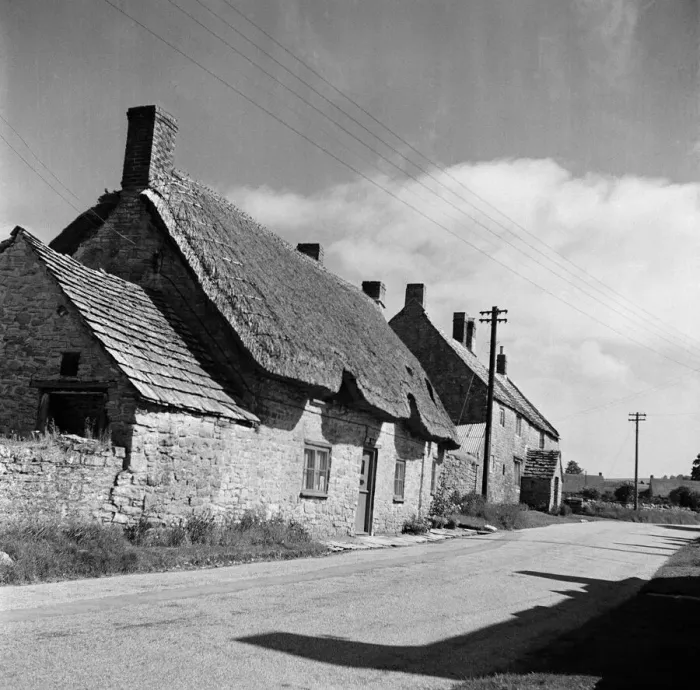 Framed Print : Corfe Castle village, Dorset. Circa 1952 Framed Print : Corfe Castle village, Dorset. Circa 1952