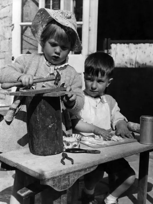 Framed Print : This corner of the nursery school has gone topsy-turvy. Boys are supposed to be fond of Framed Print : This corner of the nursery school has gone topsy-turvy. Boys are supposed to be fond of