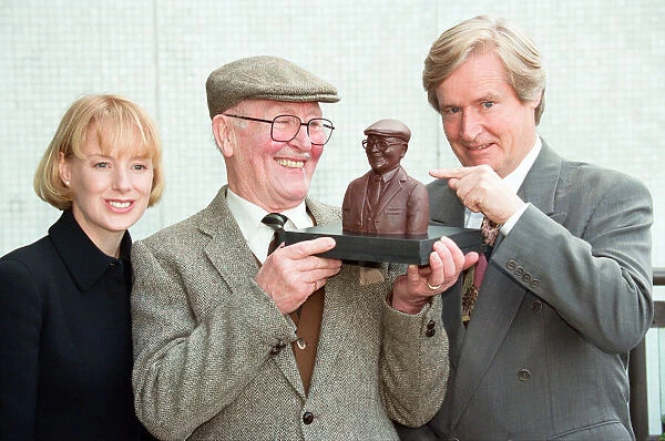 Coronation Street actor Bill Waddington with a chocolate bust of his character Percy