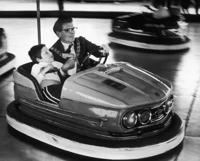Framed Print : Councillor Weaver chauffeurs Timmy Atkinson, aged 10, from Wisteria Lodge on the dodgems Framed Print : Councillor Weaver chauffeurs Timmy Atkinson, aged 10, from Wisteria Lodge on the dodgems