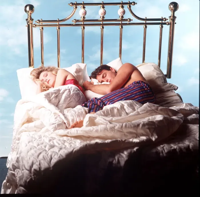 Framed Print : Couple asleep in four poster bed Framed Print : Couple asleep in four poster bed