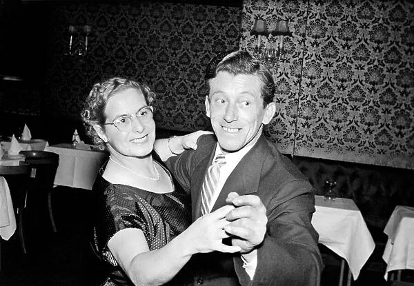 Couple dancing: Mr. and Mrs. Brown celebrating their wedding anniversary. 1956 A283-001