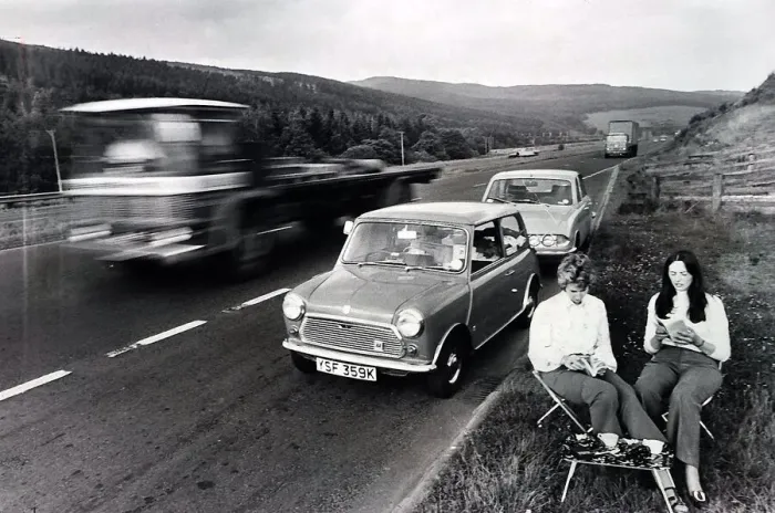 Framed Print : Couple enjoy a picnic on the A74 in Scotland. Roadside Framed Print : Couple enjoy a picnic on the A74 in Scotland. Roadside