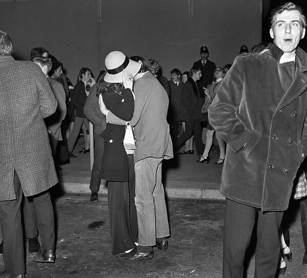 A couple kiss to celebrate New Year in Manchester. December 1969 Z12558-002