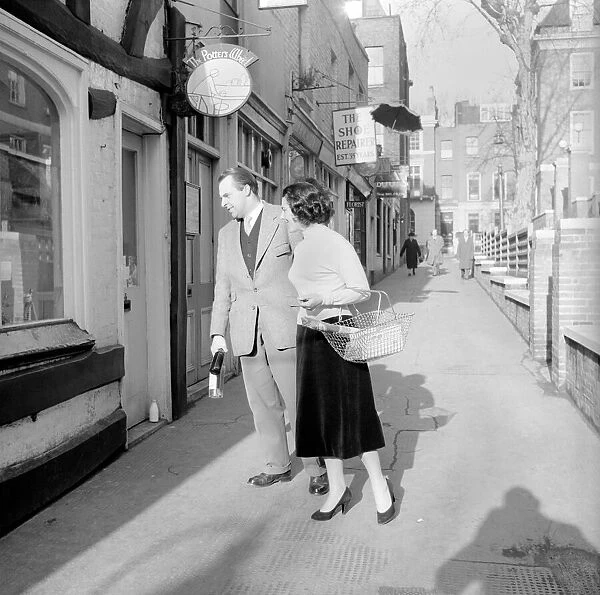 Couple Shopping: Nigel Kneale with his wife Judy Kerr seen here out shopping