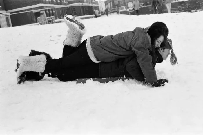 Framed Print : A couple sledging in Greenwich Park, London, 27th December 1970 Framed Print : A couple sledging in Greenwich Park, London, 27th December 1970