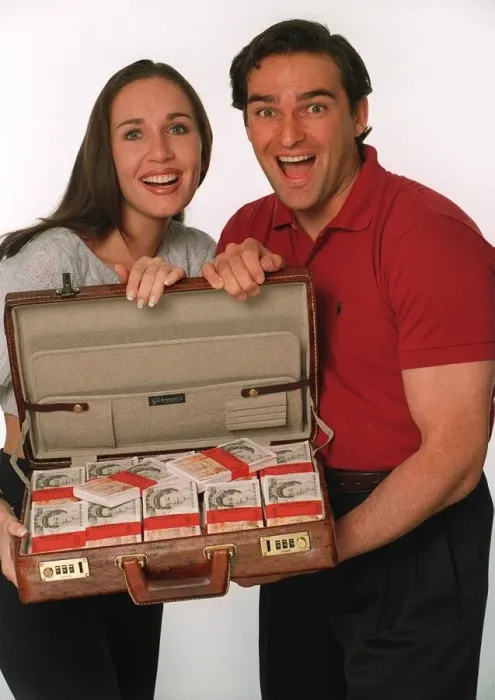 Framed Print : Couple with Suitcase of Money - Daily Mirror Promotion