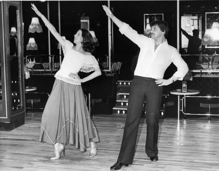 Framed Print : A couple show us how the Tango Hustle is done