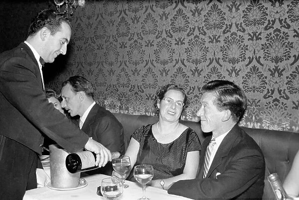 Couple toasting with champaigne Mr. and Mrs. Brown have a celebration drink on their