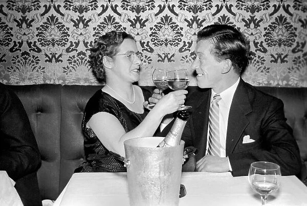 Couple toasting with champaigne Mr. and Mrs. Brown have a celebration drink on their