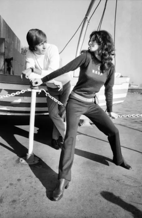 Framed Print : Couple wearing the latest leisurewear pose by a boat. November 1969 Z10672-005