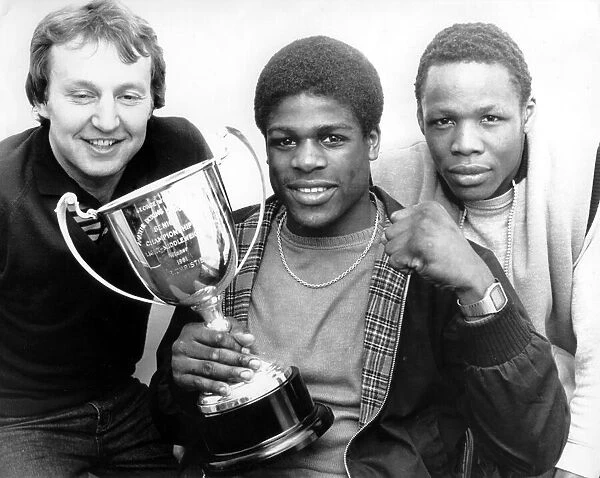 Coventry boxer Errol Christie proudly shows off the ABA light-middleweight trophy which