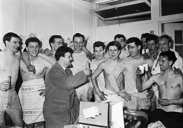 Coventry City manager Jimmy Hill celebrates with the team after drawing 2 - 2 with