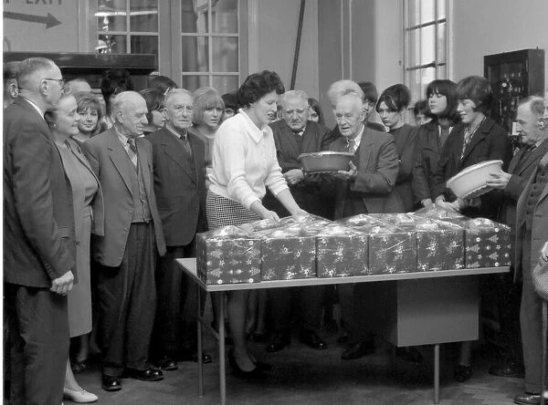 Coventry telephonists presenting Christmas parcels to residents of Bond