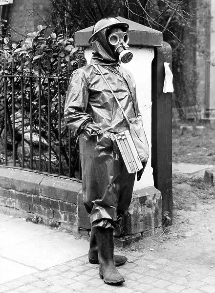 One of Coventrys A. R. P. wardens in full proctective clothing. 6th May 1941