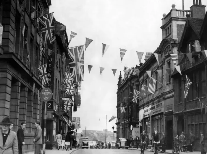 Framed Print : Coventrys High Street looking towards Earl Street is festooned with flags for the VE Framed Print : Coventrys High Street looking towards Earl Street is festooned with flags for the VE
