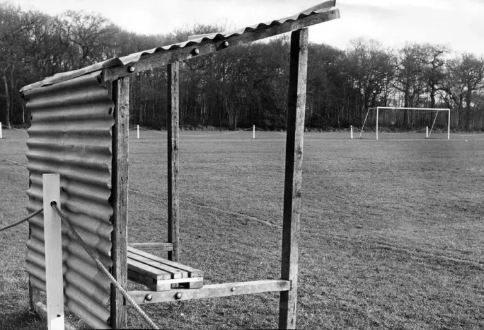 Framed Print : The only covered accommodation at Highgate United F. Cs ground - the trainers bench