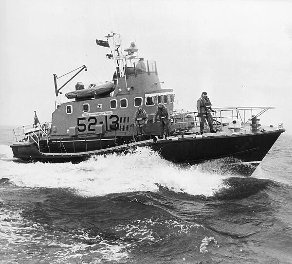 Coxswain John Hogg guides the George and Olive Turner Arun-class lifeboat into North