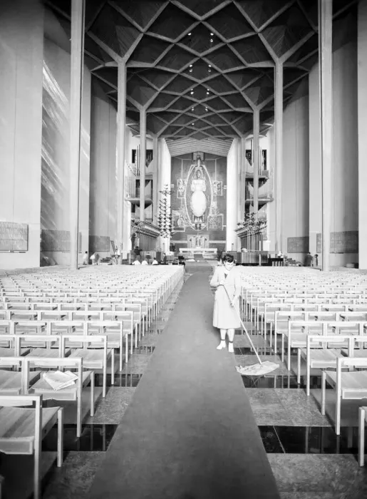 Framed Print : Craftsmen put the finishing touches to the new Coventry Cathedral which stands alongside