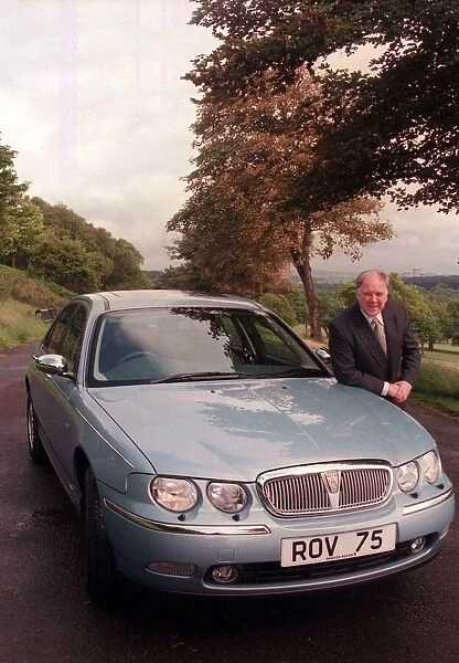 Craig Brown with new Rover 75 car June 1999
