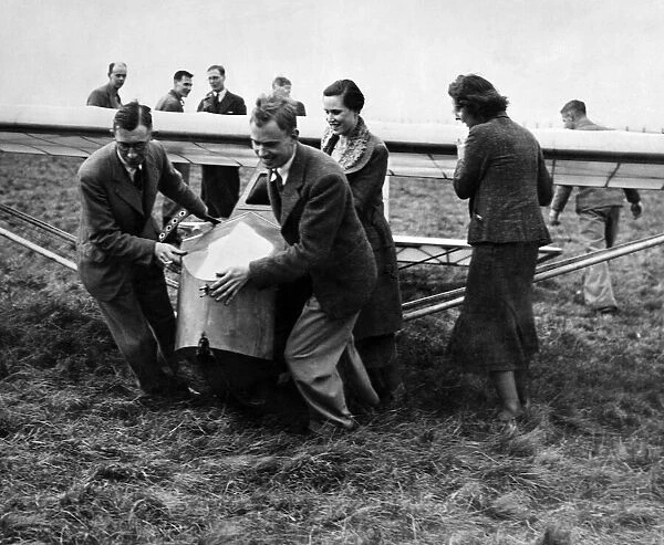 Cramlington Gliding Club members hauling into position a new machine