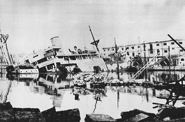 Cranes and supply ships destroyed in Naples harbour. 9th October 1943