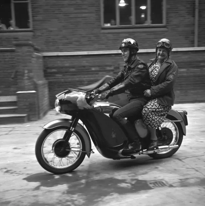 Framed Print : With her crash helmet on fair and square, and goggles flipped back