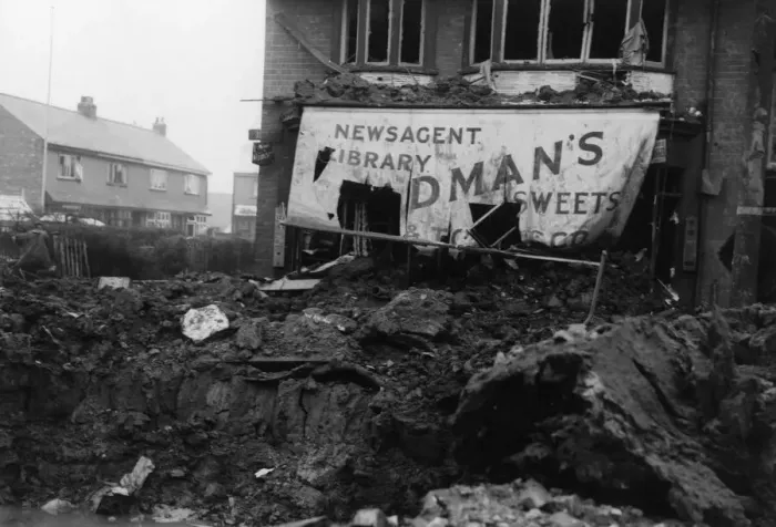 Framed Print : Crater and damage to the newsagent at the junction with Goddard Avenue and Woodlands Framed Print : Crater and damage to the newsagent at the junction with Goddard Avenue and Woodlands