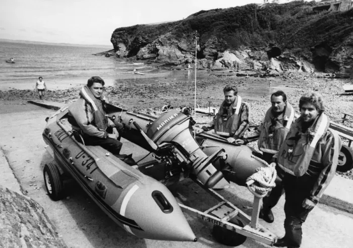 Framed Print : Crew of the 16 foot inflatable Little and Broad Haven lifeboat at Little Haven