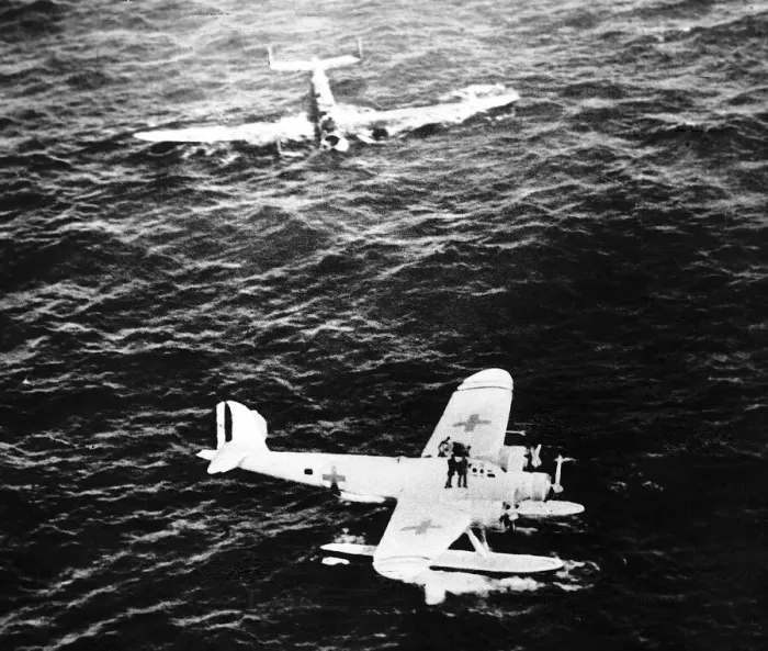 Framed Print : The crew of an air sea rescue seaplane picks up survivors from an Italian bomber shot