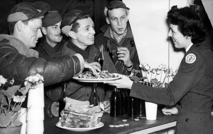 Framed Print : Crew men of the American B17 bomber Flying Fortress welcomed home by a Red Cross girl Framed Print : Crew men of the American B17 bomber Flying Fortress welcomed home by a Red Cross girl