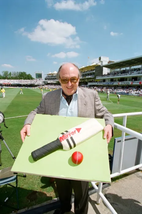 Framed Print : Cricket commentator Henry Blofeld is presented with a Daily Mirror cake in the shape of a
