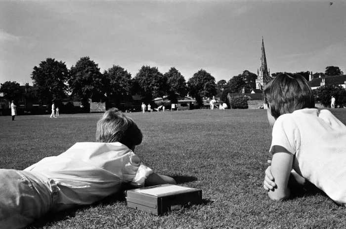 Framed Print : A cricket match takes place in the village of Wombourne in Staffordshire, England Framed Print : A cricket match takes place in the village of Wombourne in Staffordshire, England
