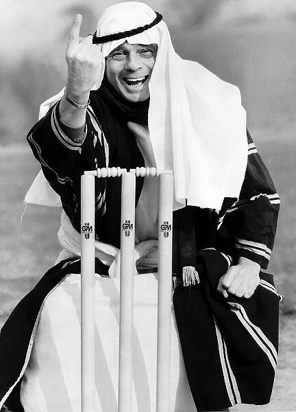 Cricket umpire Dickie Bird gets ready for his trip to Dubai. February 1983