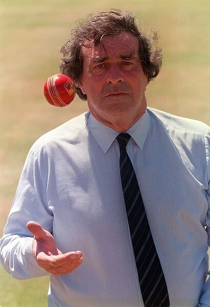 Cricketer Fred Truman in Sunday People studio July 1990 with cricket ball