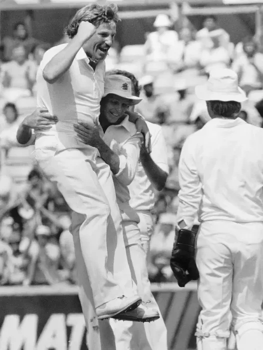 Framed Print : Cricketer Ian Botham celebrates with David Gower 1984 after taking his 300th Test Wicket