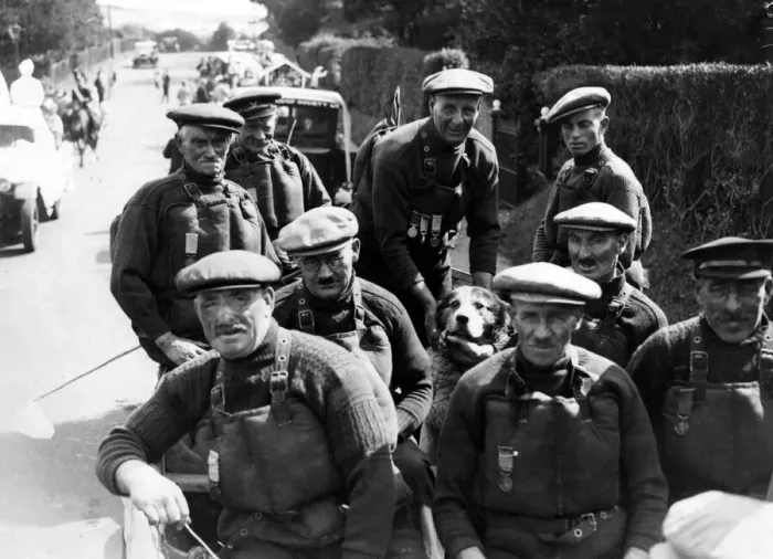 Framed Print : The Cromer lifeboat crew and the dog, Monte, they saved some years ago. They are H