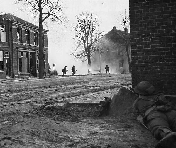 Crossing a road in Gennep which is dominated by enemy fire