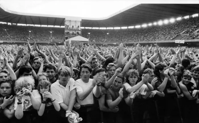 Framed Print : The crowd enjoy rock group Simple Minds in concert at The National Stadium