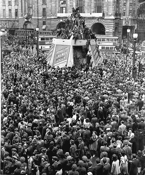 Crowd gathers in Piccadilly Circus London on VE-Day, end of WW2 in Europe