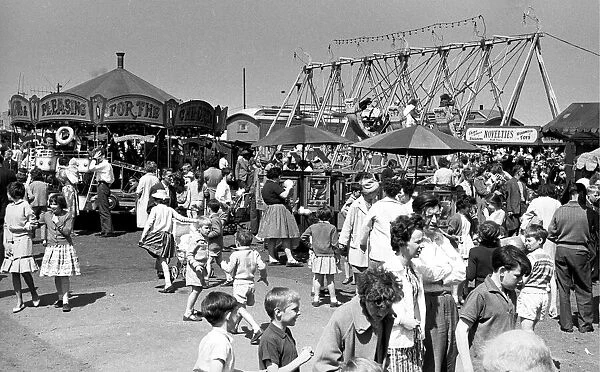 Crowd scene at the fair on Coventrys Hearsall Common 3rd June 1963
