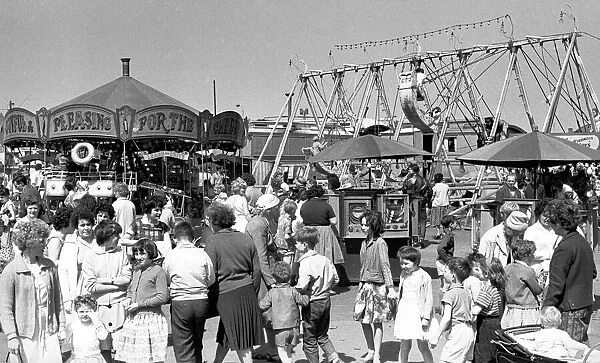 Crowd scenes at the fair On Coventrys Hearsall Common. 3rd June 1963
