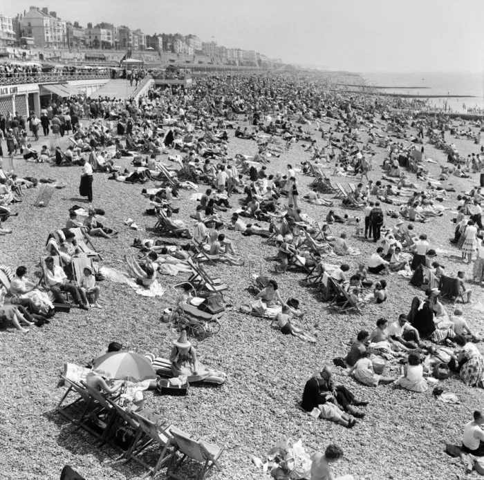 Framed Print : Crowded scenes on Brighton Beach as holidaymakers enjoy the hot summer weather Framed Print : Crowded scenes on Brighton Beach as holidaymakers enjoy the hot summer weather