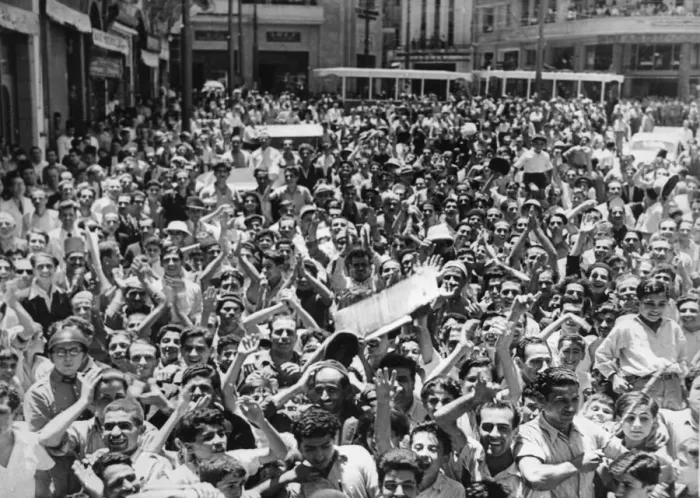 Framed Print : A crowded street in the city of Beirut as local residents turn out to cheer the British