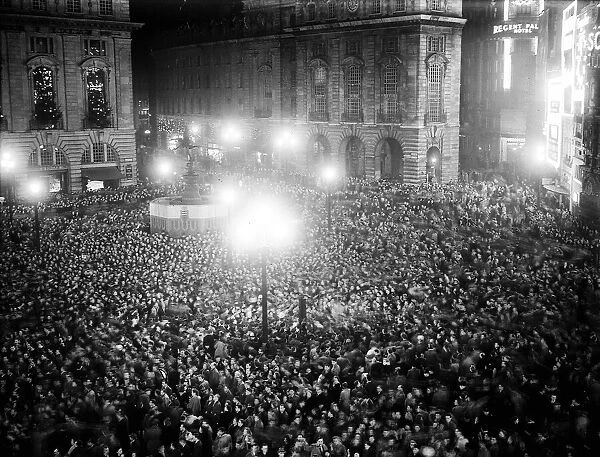 Crowds celebrate the New Year in Piccadilly 1950
