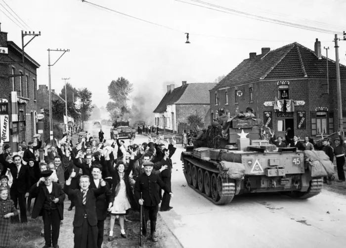 Framed Print : Crowds gather and cheer in the streets of Brussels, Belgium as British soldiers Framed Print : Crowds gather and cheer in the streets of Brussels, Belgium as British soldiers